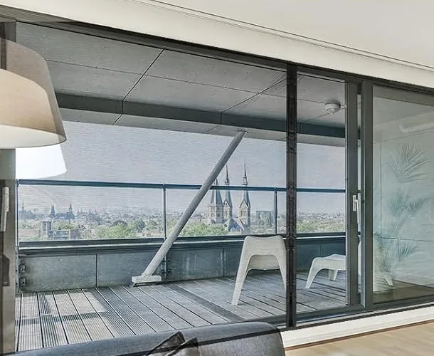 A FEGO magnetic screen across the opening of an apartment balcony