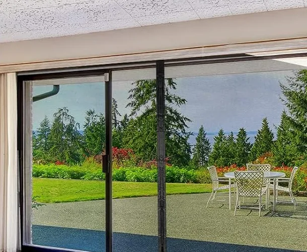 A FEGO magnetic screen across a patio door