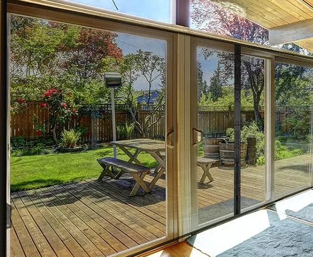 A FEGO magnetic screen across the opening of a back porch